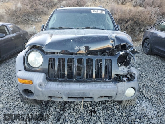 2002 Jeep Liberty Sport with VIN 1J4GL48K42W156247, listed as a Copart auction lot 86321124 with 0 mi miles and Salvage Title. Bid and sale history available at carsss.com. Image 5.