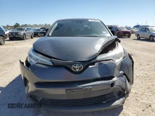 2019 Toyota C-HR XLE with VIN JTNKHMBX8K1051600, listed as a Copart auction lot 47449615 with 82,309 mi miles and Salvage Title. Bid and sale history available at DreamBid. Image 5.