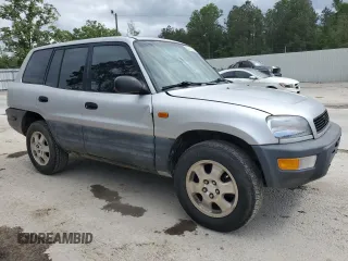 1997 Toyota RAV4 with VIN JT3GP10VXV0017900, listed as a Copart auction lot 52129235 with 163,149 mi miles and Clean Title. Bid and sale history available at DreamBid. Image 4.