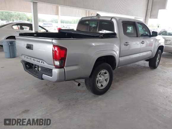 2021 Toyota Tacoma SR with VIN 3TYAX5GN9MT019636, listed as a IAAI auction lot 42497197 with 48,041 mi miles and . Bid and sale history available at DreamBid. Image 4.