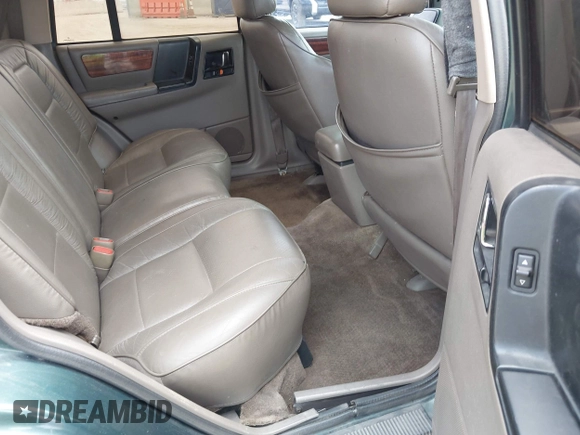1993 Jeep Grand Cherokee Limited z VIN 1J4GZ78Y7PC531299, wystawiony jako IAAI lot #42117795 z przebiegiem 168 995 mil mil oraz . Historia ofert i sprzedaży dostępna na DreamBid. Obrazek 8.