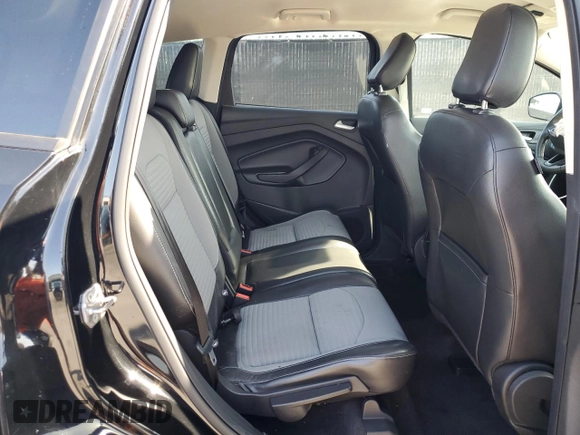 2018 Ford Escape SE z VIN 1FMCU9GD5JUB84551, wystawiony jako Copart lot #54515495 z przebiegiem 73 280 mil mil oraz Szkoda całkowita • Salvage title. Historia ofert i sprzedaży dostępna na DreamBid. Obrazek 11.