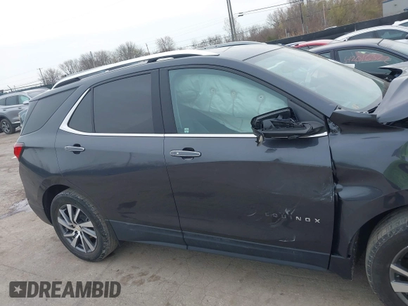 2022 Chevrolet Equinox Premier z VIN 2GNAXXEV9N6124156, wystawiony jako IAAI lot #42015711 z przebiegiem 65 808 mil mil oraz . Historia ofert i sprzedaży dostępna na DreamBid. Obrazek 13.
