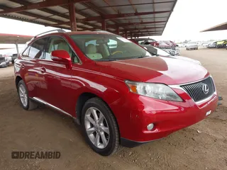 2010 Lexus RX 350 with VIN 2T2ZK1BA7AC030127, listed as a IAAI auction lot 42036093 with 128,511 mi miles. Bid and sale history available at carsss.com. Image 1.