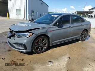 2019 Volkswagen Jetta GLI S z VIN 3VW6T7BU3KM156542, wystawiony jako Copart lot #56177095 z przebiegiem 109 526 mil mil oraz Czysty tytuł • Clean title. Historia ofert i sprzedaży dostępna na DreamBid. Obrazek 1.