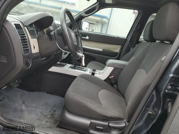 2010 Mercury Mariner with VIN 4M2CN8BG9AKJ04462, listed as a Copart auction lot 71310714 with 256,752 mi miles and Salvage Title. Bid and sale history available at carsss.com. Image 7.