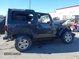 2013 Jeep Wrangler Sport with VIN 1C4AJWAG0DL645039, listed as a IAAI auction lot 41847808 with Not provided miles and . Bid and sale history available at DreamBid. Image 13.