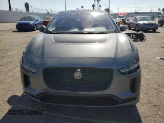 2020 Jaguar I-Pace SE z VIN SADHC2S18L1F87968, wystawiony jako Copart lot #66728514 z przebiegiem 63 267 mil mil oraz Szkoda całkowita • Salvage title. Historia ofert i sprzedaży dostępna na DreamBid. Obrazek 5.