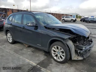 2014 BMW X1 xDrive28i with VIN WBAVL1C57EVY24448, listed as a Copart auction lot 50648365 with 79,764 mi miles and Salvage Title. Bid and sale history available at carsss.com. Image 4.