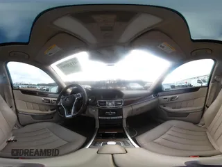 2014 Mercedes-Benz E 550 Sport with VIN WDDHF9BB5EA949457, listed as a IAAI auction lot 41128583 with 99,248 mi miles and . Bid and sale history available at DreamBid. Image 18.