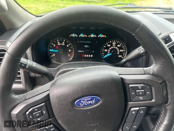 2018 Ford F-150 XL z VIN 1FTFX1E5XJFA79594, wystawiony jako Copart lot #65503505 z przebiegiem 158 280 mil mil oraz Czysty tytuł • Clean title. Historia ofert i sprzedaży dostępna na DreamBid. Obrazek 8.