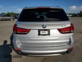 2017 BMW X5 sDrive35i with VIN 5UXKR2C51H0U19230, listed as a Copart auction lot 52731495 with 64,454 mi miles and Salvage Title. Bid and sale history available at carsss.com. Image 6.
