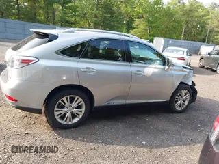 2012 Lexus RX 450h z VIN JTJBC1BA3C2428467, wystawiony jako IAAI lot #42394728 z przebiegiem 77 280 mil mil oraz . Historia ofert i sprzedaży dostępna na DreamBid. Obrazek 13.