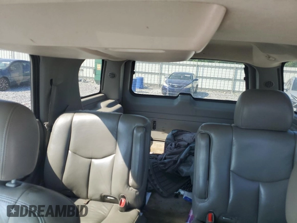 2004 Chevrolet Tahoe LT with VIN 1GNEC13ZX4J304070, listed as a Copart auction lot 59779655 with 123,241 mi miles and Salvage title. Bid and sale history available at DreamBid. Image 10.