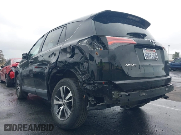2018 Toyota RAV4 XLE with VIN 2T3WFREV3JW516867, listed as a IAAI auction lot 41765369 with 54,390 mi miles. Bid and sale history available at carsss.com. Image 6.