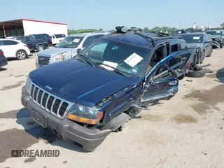 2000 Jeep Grand Cherokee Laredo with VIN 1J4G248S5YC413977, listed as a IAAI auction lot 42045808 with Not provided miles and . Bid and sale history available at DreamBid. Image 17.