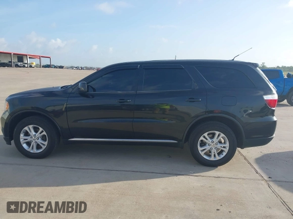 2012 Dodge Durango SXT with VIN 1C4RDJAG7CC293167, listed as a IAAI auction lot 42446634 with 140,182 mi miles and . Bid and sale history available at DreamBid. Image 14.