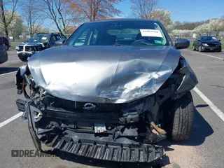 2018 Nissan Sentra SV with VIN 3N1AB7AP3JL633148, listed as a IAAI auction lot 41983588 with 148,479 mi miles and . Bid and sale history available at DreamBid. Image 6.