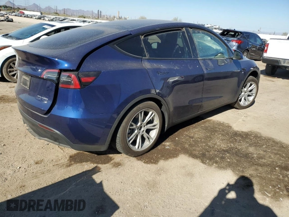 2023 Tesla Model Y Long Range with VIN 7SAYGDEE3PA081226, listed as a Copart auction lot 88674385 with Not Provided miles and Salvage Title. Bid and sale history available at DreamBid. Image 3.
