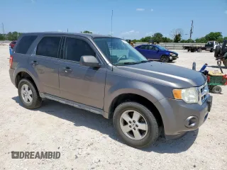 2009 Ford Escape XLS with VIN 1FMCU02739KC12318, listed as a Copart auction lot 61251485 with 179,335 mi miles and Salvage title. Bid and sale history available at DreamBid. Image 4.