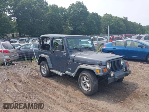 2001 Jeep Wrangler Sport with VIN 1J4FA49S91P330175, listed as a IAAI auction lot 40133432 with 999,999 mi miles. Bid and sale history available at carsss.com. Image 1.