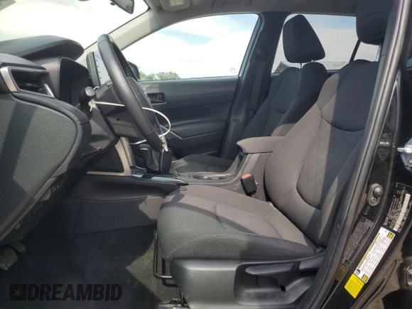2022 Toyota Corolla Cross LE with VIN 7MUCAABG3NV021235, listed as a Copart auction lot 60644285 with 82,403 mi miles and Clean title. Bid and sale history available at DreamBid. Image 7.