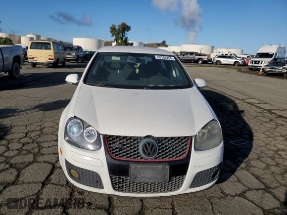 2009 Volkswagen GTI z VIN WVWHD71KX9W061673, wystawiony jako Copart lot #80168754 z przebiegiem 153 396 mil mil oraz Czysty tytuł • Clean title. Historia ofert i sprzedaży dostępna na DreamBid. Obrazek 5.