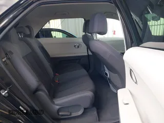 2024 Hyundai Ioniq 5 SE z VIN KM8KM4DE5RU246280, wystawiony jako IAAI lot #41506472 z przebiegiem 15 679 mil mil oraz . Historia ofert i sprzedaży dostępna na DreamBid. Obrazek 8.