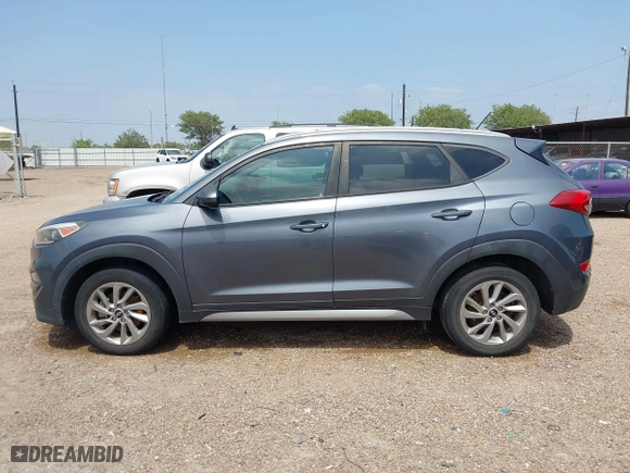 2017 Hyundai Tucson SE Plus with VIN KM8J33A42HU375273, listed as a IAAI auction lot 41900474 with 124,658 mi miles. Bid and sale history available at carsss.com. Image 14.