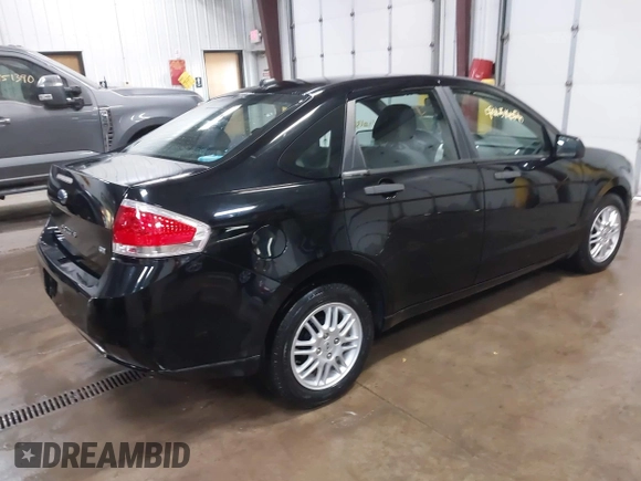 2011 Ford Focus SE with VIN 1FAHP3FN5BW192119, listed as a IAAI auction lot 41193926 with 113,435 mi miles. Bid and sale history available at carsss.com. Image 4.