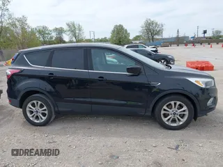 2017 Ford Escape SE with VIN 1FMCU0GD3HUC91104, listed as a IAAI auction lot 42142522 with 107,147 mi miles. Bid and sale history available at carsss.com. Image 13.