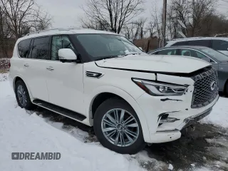 2024 Infiniti QX80 LUXE with VIN JN8AZ2AE4R9328082, listed as a Copart auction lot 45181285 with 27,999 mi miles and Salvage Title. Bid and sale history available at carsss.com. Image 4.