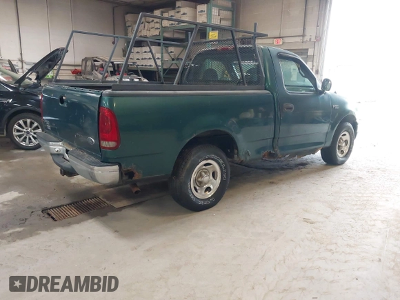 2000 Ford F-150 XL with VIN 2FTZF1722YCA27112, listed as a IAAI auction lot 42687404 with Not provided miles and . Bid and sale history available at DreamBid. Image 4.