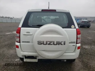 2008 Suzuki Grand Vitara w/Spare & Cargo Covers с VIN JS3TD941884102404, выставлен на аукционе Copart как лот 86215464 с пробегом 116 173 миль миль и Списание • Salvage title. История ставок и продаж доступна на DreamBid. Изображение 6.