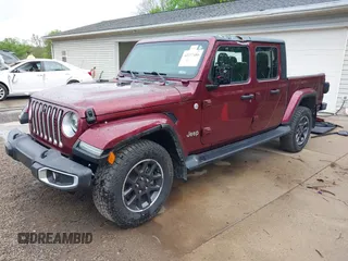 2021 Jeep Gladiator Overland with VIN 1C6HJTFGXML555622, listed as a IAAI auction lot 42237686 with 62,358 mi miles and . Bid and sale history available at DreamBid. Image 22.