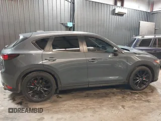 2021 Mazda CX-5 Touring with VIN JM3KFBCM5M0365725, listed as a IAAI auction lot 41411763 with 77,504 mi miles. Bid and sale history available at carsss.com. Image 14.