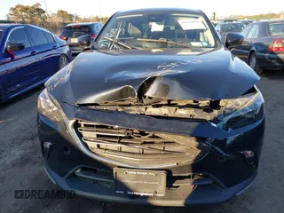 2019 Mazda CX-3 Grand Touring z VIN JM1DKFD78K0417780, wystawiony jako IAAI lot #41573009 z przebiegiem 70 002 mil mil oraz . Historia ofert i sprzedaży dostępna na DreamBid. Obrazek 12.