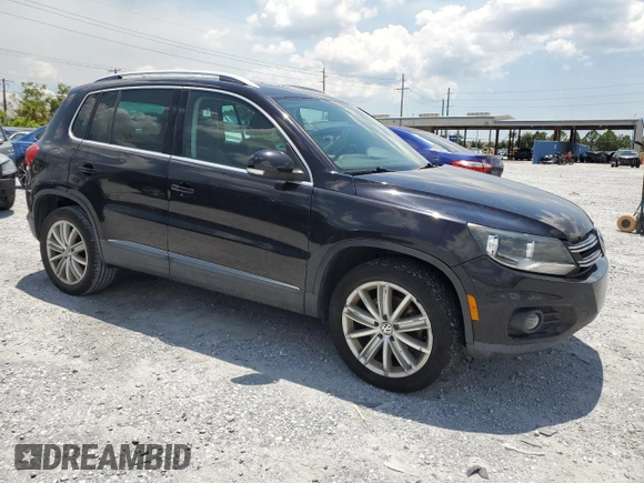 2014 Volkswagen Tiguan SE z VIN WVGAV3AX8EW613762, wystawiony jako Copart lot #61385765 z przebiegiem 167 278 mil mil oraz Czysty tytuł • Clean title. Historia ofert i sprzedaży dostępna na DreamBid. Obrazek 4.