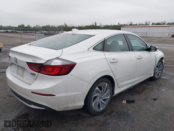 2021 Honda Insight Touring with VIN 19XZE4F94ME003177, listed as a IAAI auction lot 41377381 with 51,377 mi miles and . Bid and sale history available at carsss.com. Image 4.