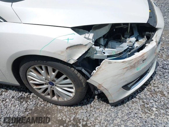 2016 Ford Focus Titanium with VIN 1FADP3N26GL332709, listed as a IAAI auction lot 42458997 with 75,509 mi miles and . Bid and sale history available at DreamBid. Image 6.