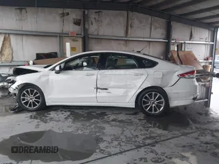 2017 Ford Fusion SE with VIN 3FA6P0H74HR196954, listed as a IAAI auction lot 41636002 with 70,366 mi miles and . Bid and sale history available at DreamBid. Image 14.
