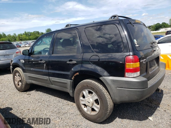 2003 Ford Escape XLT Popular 2 with VIN 1FMYU93133KB35168, listed as a Copart auction lot 57303335 with 197,368 mi miles and Salvage title. Bid and sale history available at DreamBid. Image 2.