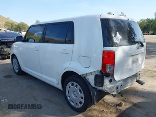 2015 Scion xB with VIN JTLZE4FE3FJ080193, listed as a IAAI auction lot 41976842 with 164,988 mi miles. Bid and sale history available at carsss.com. Image 3.