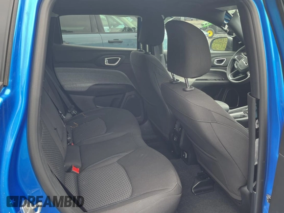 2025 Jeep Compass Sport with VIN 3C4NJDAN5ST528384, listed as a Copart auction lot 56180685 with 4,982 mi miles and Salvage title. Bid and sale history available at DreamBid. Image 6.