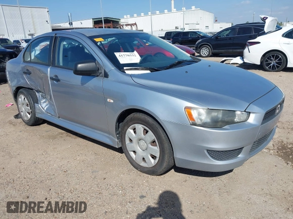 2010 Mitsubishi Lancer DE with VIN JA32U1FU4AU015574, listed as a IAAI auction lot 41770332 with 125,458 mi miles. Bid and sale history available at carsss.com. Image 1.