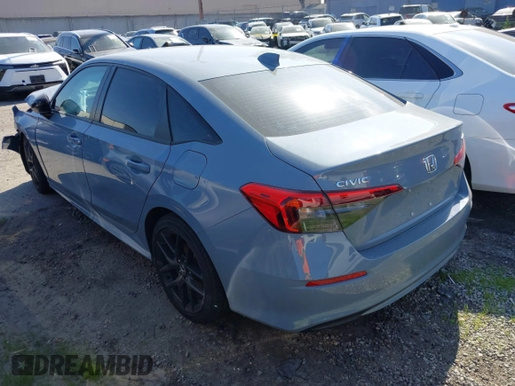 2023 Honda Civic Sport z VIN 2HGFE2F50PH556813, wystawiony jako IAAI lot #41364523 z przebiegiem 8 999 mil mil oraz . Historia ofert i sprzedaży dostępna na DreamBid. Obrazek 3.