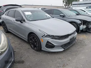 2023 Kia K5 GT-Line z VIN 5XXG64J25PG181772, wystawiony jako IAAI lot #42283124 z przebiegiem 40 857 mil mil oraz . Historia ofert i sprzedaży dostępna na DreamBid. Obrazek 1.