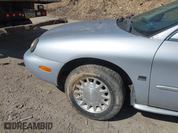 1999 Mercury Sable LS z VIN 1MEFM53S7XA622932, wystawiony jako IAAI lot #41708531 z przebiegiem 155 702 mil mil oraz . Historia ofert i sprzedaży dostępna na DreamBid. Obrazek 14.