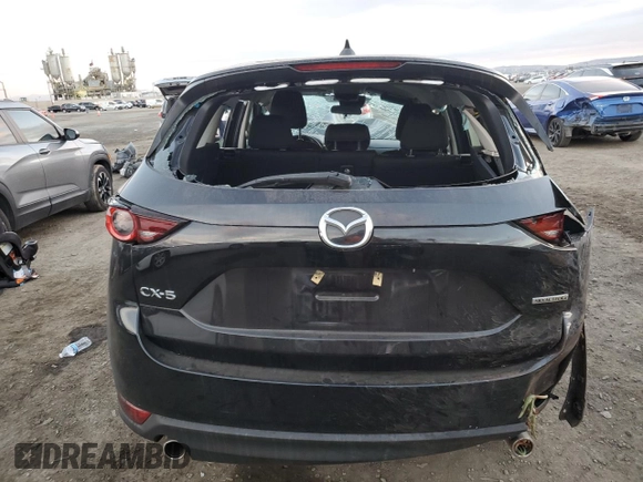 2021 Mazda CX-5 Sport with VIN JM3KFABM3M1334284, listed as a Copart auction lot 86915194 with 0 mi miles and Salvage Title. Bid and sale history available at carsss.com. Image 6.