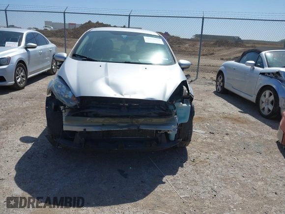 2019 Ford Fiesta SE with VIN 3FADP4EJ0KM148614, listed as a IAAI auction lot 41860070 with 68,361 mi miles and . Bid and sale history available at DreamBid. Image 6.